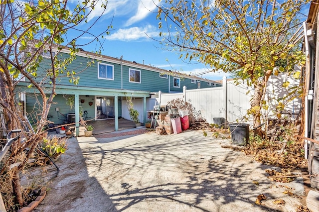 back of property featuring a patio area