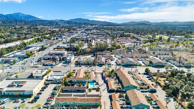 birds eye view of property with a mountain view