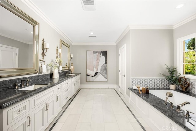 bathroom featuring tile patterned flooring, vanity, a tub, and ornamental molding