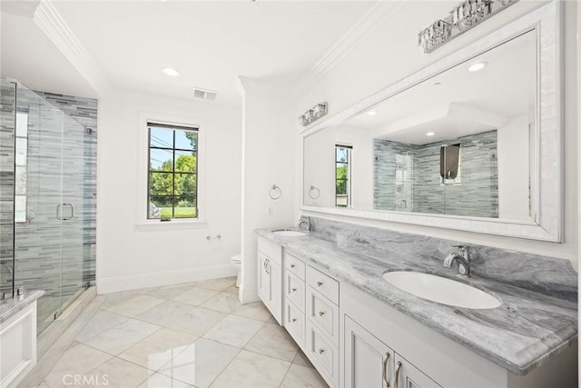 bathroom with vanity, toilet, an enclosed shower, and ornamental molding