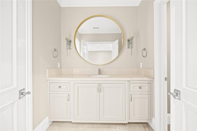 bathroom with tile patterned flooring, vanity, and ornamental molding