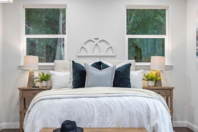 bedroom with wood-type flooring