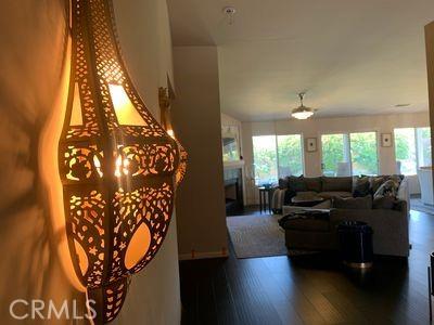 living room with dark hardwood / wood-style flooring