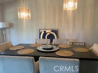 dining room with a chandelier