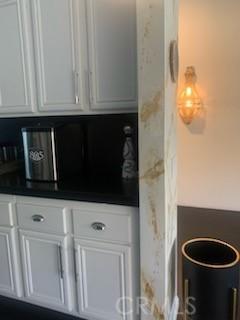 kitchen featuring white cabinetry