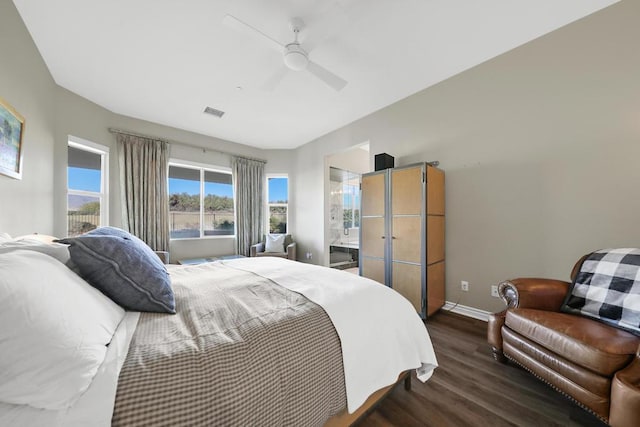 bedroom featuring ceiling fan and dark hardwood / wood-style floors