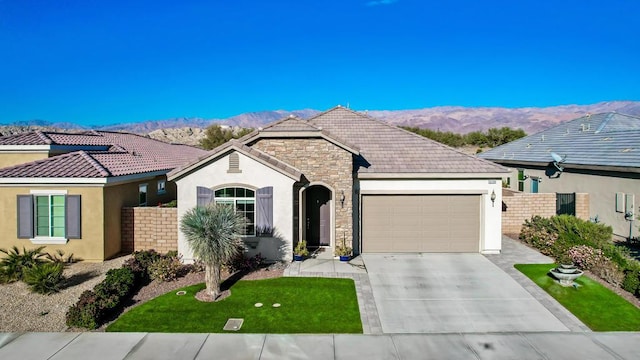 ranch-style home featuring a garage