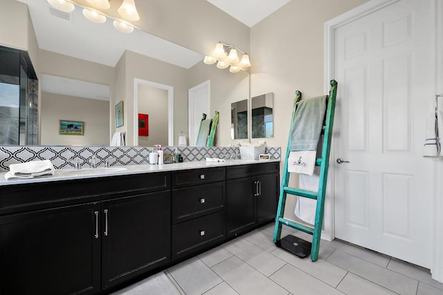 bathroom featuring tile patterned floors and vanity