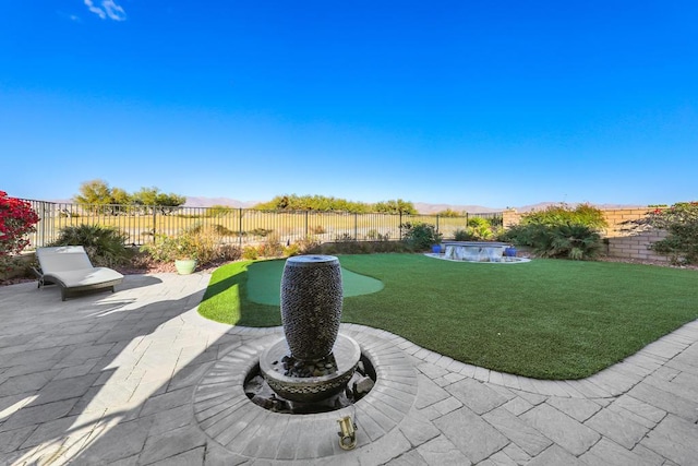 view of patio / terrace with a fenced in pool