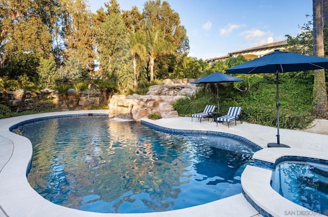 view of pool featuring a patio