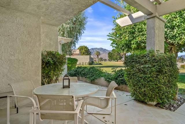 view of patio with a mountain view