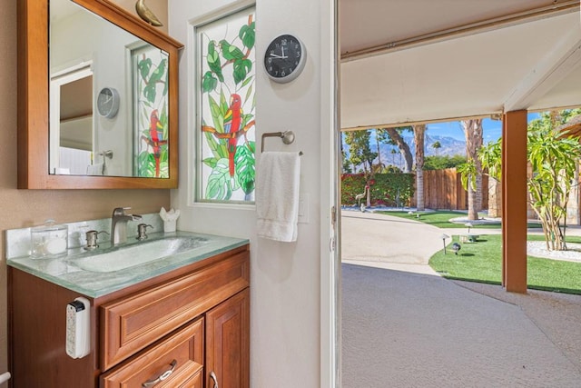 bathroom featuring vanity and a wealth of natural light