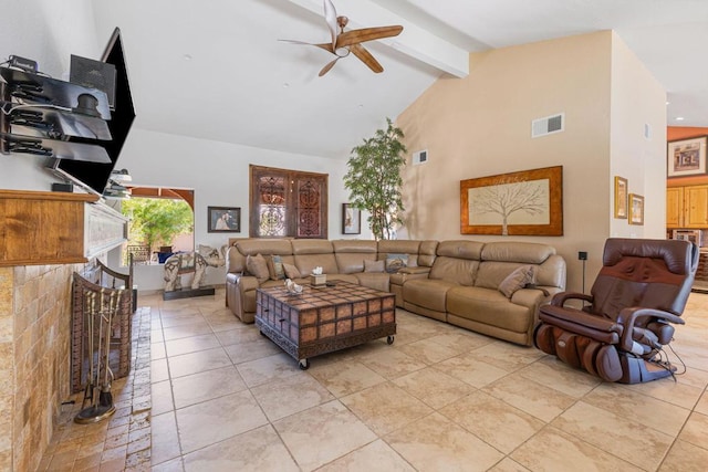 living room featuring beam ceiling, light tile patterned floors, high vaulted ceiling, and ceiling fan