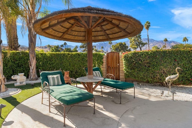 view of patio / terrace with a mountain view