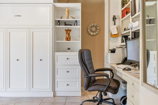 office space with light tile patterned flooring