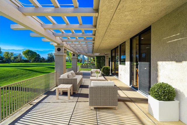 view of patio / terrace with an outdoor living space and a pergola