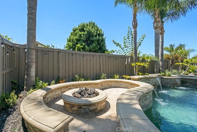 view of swimming pool featuring pool water feature