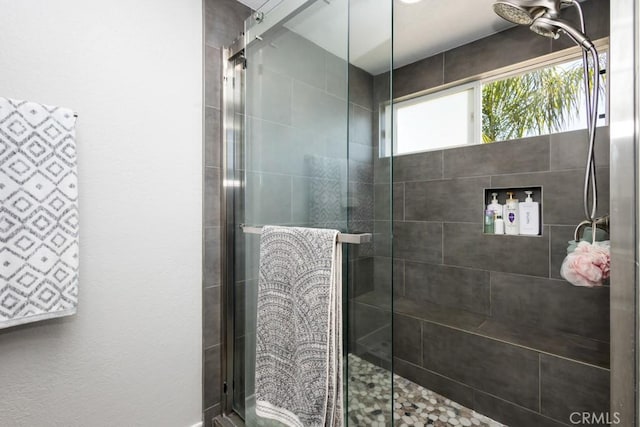 bathroom featuring an enclosed shower