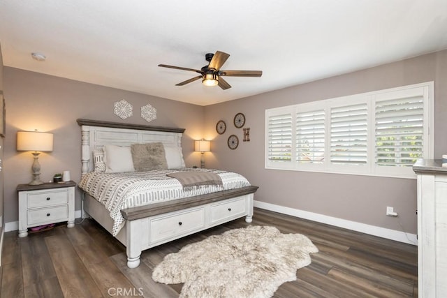 bedroom with ceiling fan and dark wood-type flooring