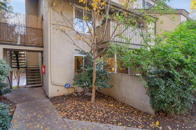 view of property exterior featuring a balcony