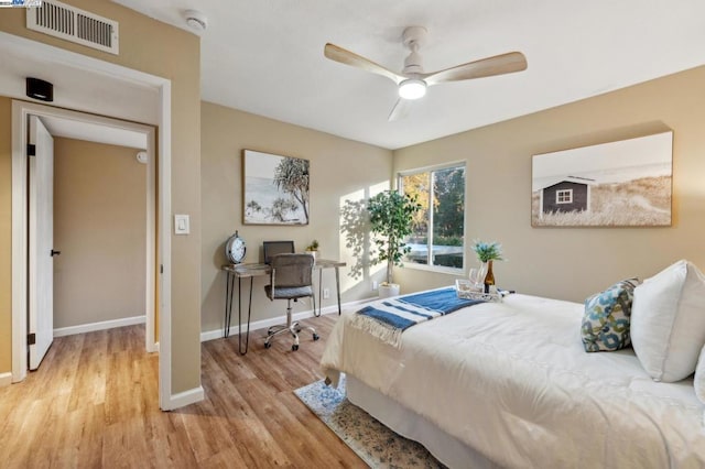 bedroom featuring ceiling fan and light hardwood / wood-style floors