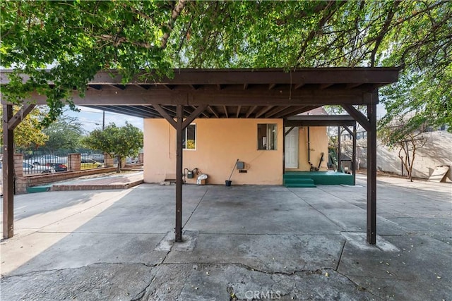 view of patio featuring a carport