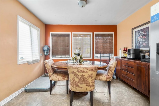 view of tiled dining space