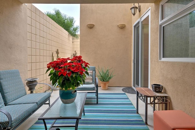 balcony featuring a patio area