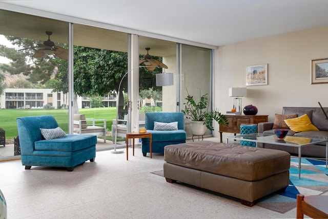 living room with ceiling fan