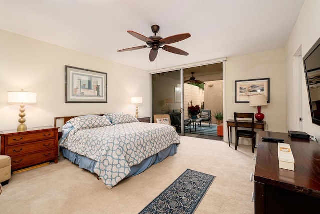 bedroom with ceiling fan, light carpet, and access to outside