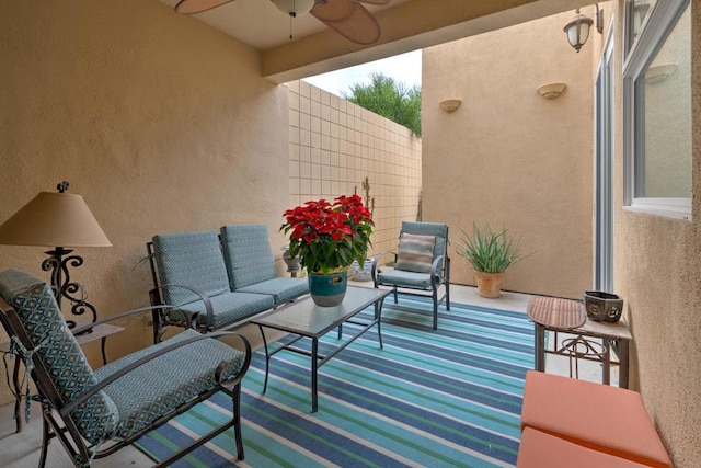 view of patio featuring ceiling fan and an outdoor hangout area