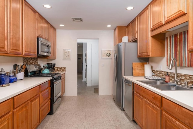 kitchen featuring stainless steel appliances and sink