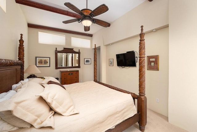 bedroom with ceiling fan and light carpet