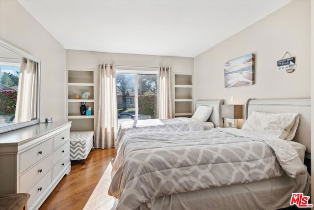 bedroom featuring hardwood / wood-style flooring