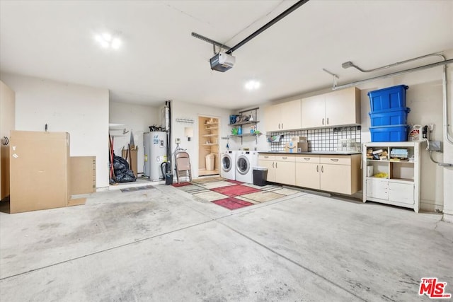 garage with washer and dryer, a garage door opener, and water heater