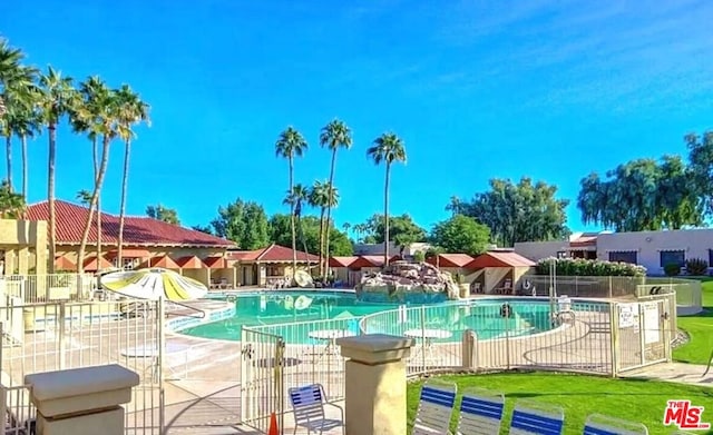 view of pool featuring a patio