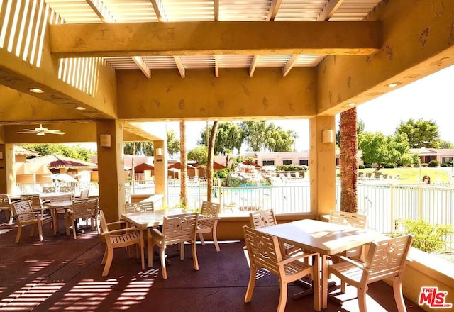 view of patio / terrace featuring ceiling fan