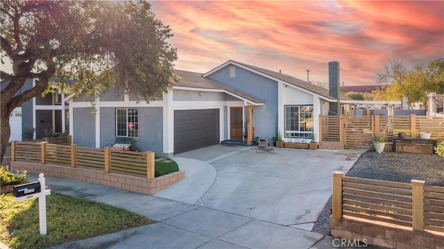 single story home featuring a garage