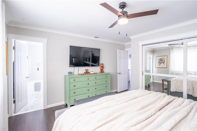 bedroom with ceiling fan, ornamental molding, connected bathroom, and dark hardwood / wood-style flooring