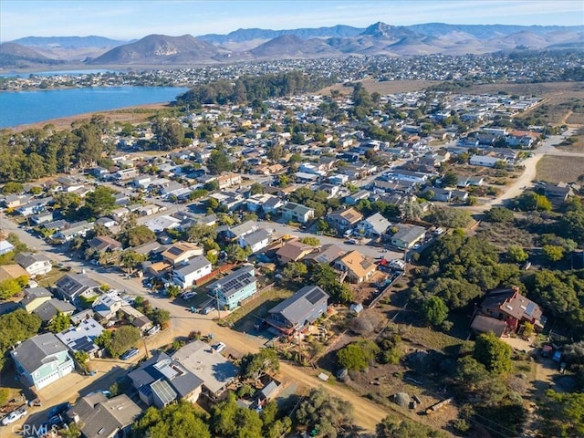 bird's eye view with a water and mountain view