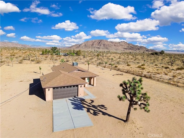 birds eye view of property featuring a mountain view