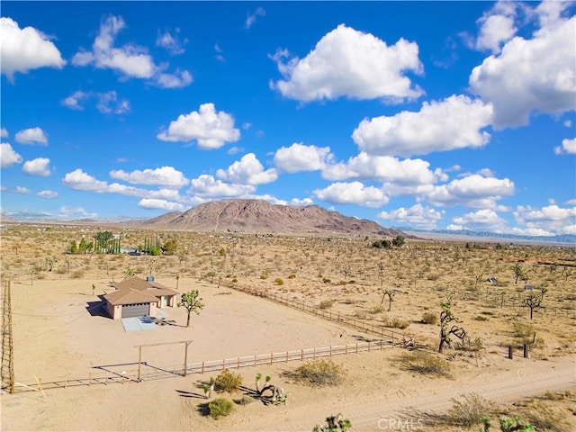 mountain view featuring a rural view