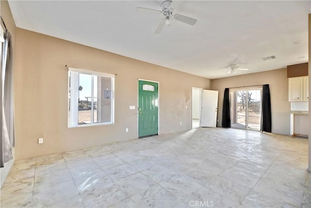 empty room featuring ceiling fan