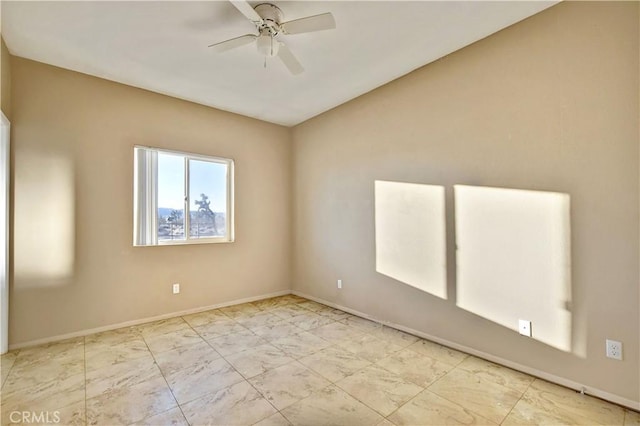 spare room featuring ceiling fan