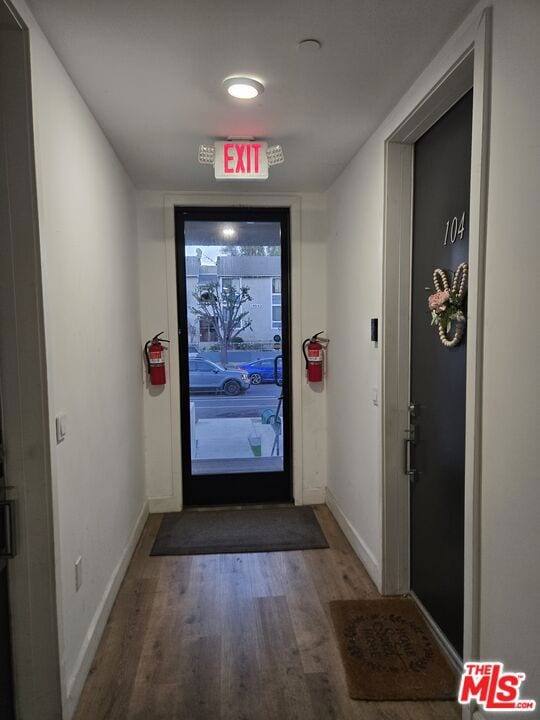 doorway featuring hardwood / wood-style floors