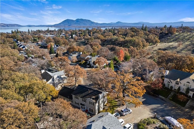 birds eye view of property with a mountain view