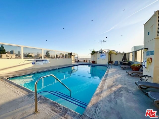 view of pool with a patio area