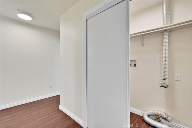 washroom featuring hookup for a washing machine, dark wood-type flooring, and hookup for an electric dryer