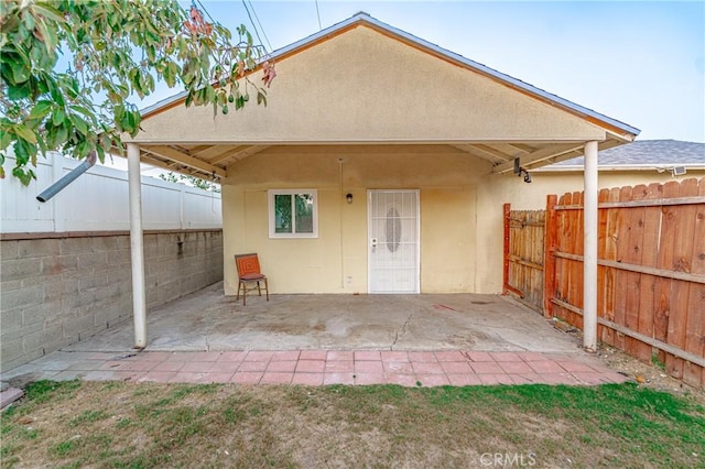 rear view of property with a patio area