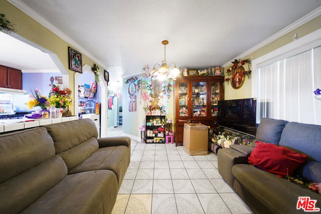 tiled living room featuring an inviting chandelier and ornamental molding